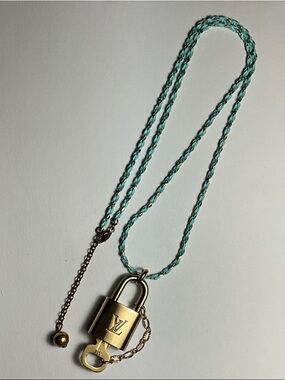 Authentic Louis Vuitton Brass Padlock and Key #314 put on a chain